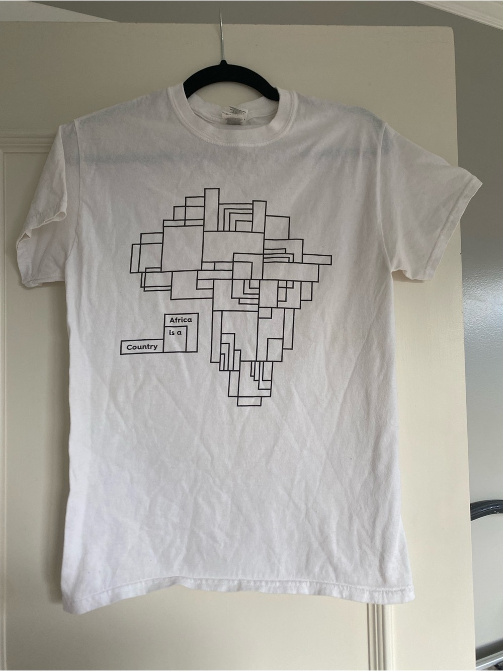 White Graphic Men’s T-Shirt with Geometric Africa Design